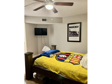 Beautiful view from balcony of golf course and water this 2/2 is on Poinciana Golf Club in Florida - for sale on GolfHomes.com, golf home, golf lot