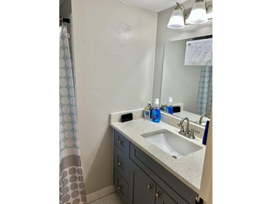 Beautiful view from balcony of golf course and water this 2/2 is on Poinciana Golf Club in Florida - for sale on GolfHomes.com, golf home, golf lot