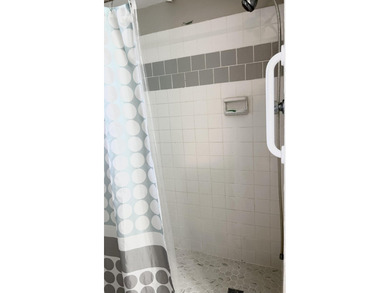 Beautiful view from balcony of golf course and water this 2/2 is on Poinciana Golf Club in Florida - for sale on GolfHomes.com, golf home, golf lot