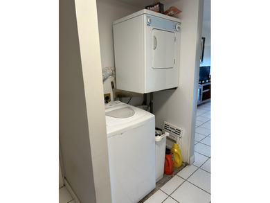 Beautiful view from balcony of golf course and water this 2/2 is on Poinciana Golf Club in Florida - for sale on GolfHomes.com, golf home, golf lot