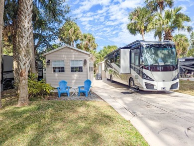 Located in an exclusive gated community with a championship on The Great Outdoors Golf and Country Club in Florida - for sale on GolfHomes.com, golf home, golf lot