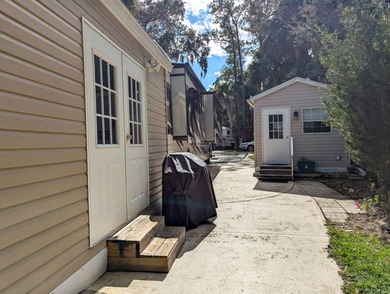 Located in an exclusive gated community with a championship on The Great Outdoors Golf and Country Club in Florida - for sale on GolfHomes.com, golf home, golf lot