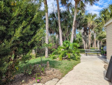 Located in an exclusive gated community with a championship on The Great Outdoors Golf and Country Club in Florida - for sale on GolfHomes.com, golf home, golf lot