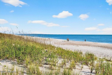 Introducing this top-floor oceanfront stunner, fully furnished on Oak Island Golf Club in North Carolina - for sale on GolfHomes.com, golf home, golf lot