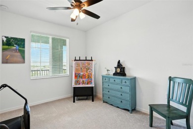 TOP FLOOR Birkdale floorplan with spectacular water and nature on Heritage Landing Golf  in Florida - for sale on GolfHomes.com, golf home, golf lot