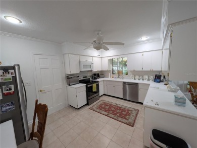 Beautiful estate home on a corner lot in Temple Terrace Estates on Temple Terrace Golf and Country Club in Florida - for sale on GolfHomes.com, golf home, golf lot