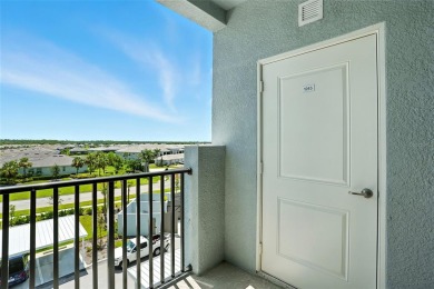 TOP FLOOR Birkdale floorplan with spectacular water and nature on Heritage Landing Golf  in Florida - for sale on GolfHomes.com, golf home, golf lot