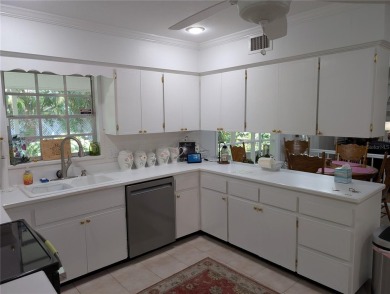 Beautiful estate home on a corner lot in Temple Terrace Estates on Temple Terrace Golf and Country Club in Florida - for sale on GolfHomes.com, golf home, golf lot