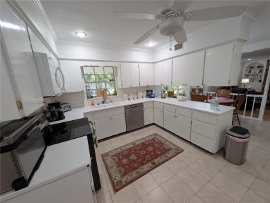 Beautiful estate home on a corner lot in Temple Terrace Estates on Temple Terrace Golf and Country Club in Florida - for sale on GolfHomes.com, golf home, golf lot