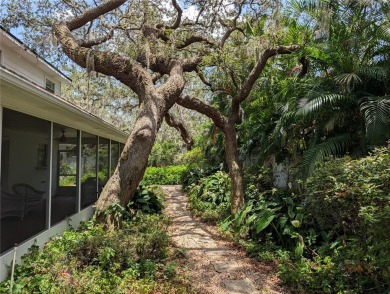 Beautiful estate home on a corner lot in Temple Terrace Estates on Temple Terrace Golf and Country Club in Florida - for sale on GolfHomes.com, golf home, golf lot