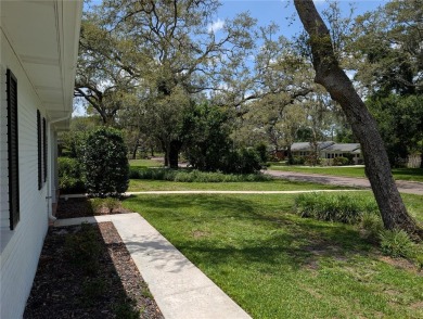 Beautiful estate home on a corner lot in Temple Terrace Estates on Temple Terrace Golf and Country Club in Florida - for sale on GolfHomes.com, golf home, golf lot