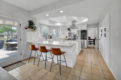 WELCOME TO 5102 TEAKWOOD TRACE, A REFINED RETREAT IN THE HEART on Green Tree Country Club in Texas - for sale on GolfHomes.com, golf home, golf lot