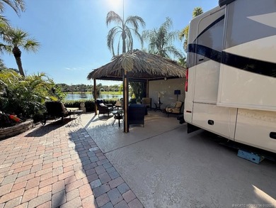 STUNNING LAKE VIEW! Get ready to fall in love with this on St. Lucie Trail Golf Club in Florida - for sale on GolfHomes.com, golf home, golf lot
