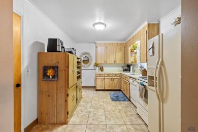 Charming West Side Home - Prime Location!  Enjoy main-level on Meadowbrook Golf Course in South Dakota - for sale on GolfHomes.com, golf home, golf lot