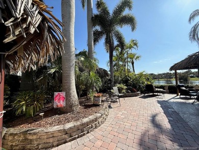STUNNING LAKE VIEW! Get ready to fall in love with this on St. Lucie Trail Golf Club in Florida - for sale on GolfHomes.com, golf home, golf lot