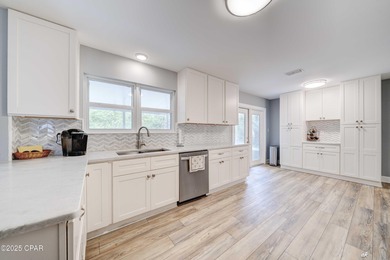 ***STUNNING REMODEL IN COLONY CLUB*** Discover modern elegance on Holiday Golf Club in Florida - for sale on GolfHomes.com, golf home, golf lot