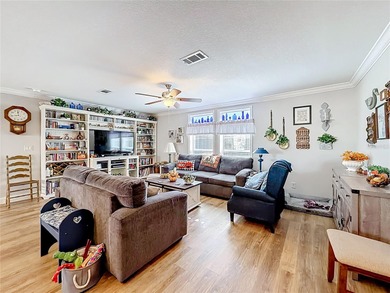 INTRODUCING this VERY unique, yet MODERN, hurricane RESISTANT on Lily Lake Golf and RV Resort in Florida - for sale on GolfHomes.com, golf home, golf lot