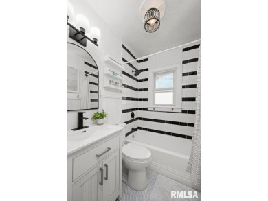 Welcome to this beautifully updated 3-bedroom, 1-bath home on Saukie Municipal Golf Course in Illinois - for sale on GolfHomes.com, golf home, golf lot