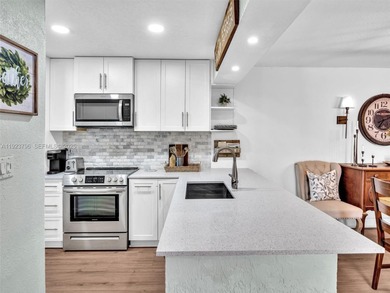 Now offered at $449,999 -- newly priced for quick sale! Perfect on Pembroke Lakes Golf Club in Florida - for sale on GolfHomes.com, golf home, golf lot