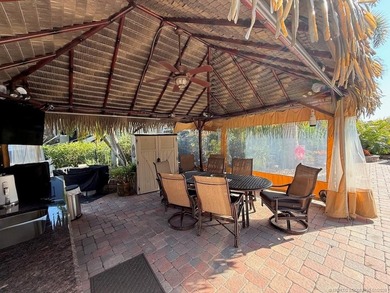 STUNNING LAKE VIEW! Get ready to fall in love with this on St. Lucie Trail Golf Club in Florida - for sale on GolfHomes.com, golf home, golf lot