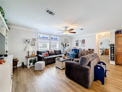 INTRODUCING this VERY unique, yet MODERN, hurricane RESISTANT on Lily Lake Golf and RV Resort in Florida - for sale on GolfHomes.com, golf home, golf lot