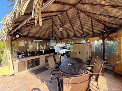 STUNNING LAKE VIEW! Get ready to fall in love with this on St. Lucie Trail Golf Club in Florida - for sale on GolfHomes.com, golf home, golf lot