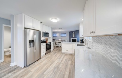 ***STUNNING REMODEL IN COLONY CLUB*** Discover modern elegance on Holiday Golf Club in Florida - for sale on GolfHomes.com, golf home, golf lot