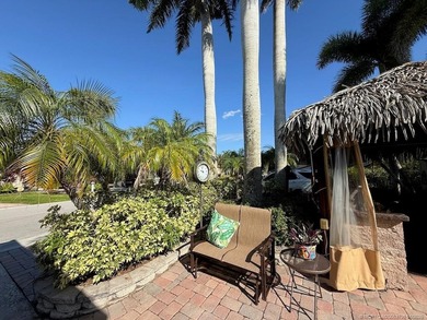 STUNNING LAKE VIEW! Get ready to fall in love with this on St. Lucie Trail Golf Club in Florida - for sale on GolfHomes.com, golf home, golf lot
