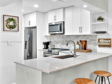 Now offered at $449,999 -- newly priced for quick sale! Perfect on Pembroke Lakes Golf Club in Florida - for sale on GolfHomes.com, golf home, golf lot