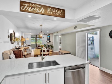 Now offered at $449,999 -- newly priced for quick sale! Perfect on Pembroke Lakes Golf Club in Florida - for sale on GolfHomes.com, golf home, golf lot