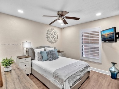 Now offered at $449,999 -- newly priced for quick sale! Perfect on Pembroke Lakes Golf Club in Florida - for sale on GolfHomes.com, golf home, golf lot