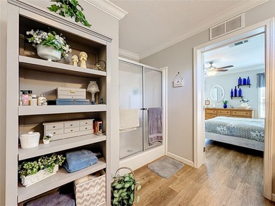 INTRODUCING this VERY unique, yet MODERN, hurricane RESISTANT on Lily Lake Golf and RV Resort in Florida - for sale on GolfHomes.com, golf home, golf lot