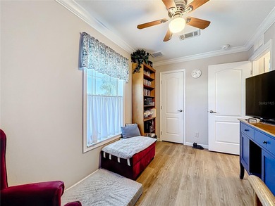 INTRODUCING this VERY unique, yet MODERN, hurricane RESISTANT on Lily Lake Golf and RV Resort in Florida - for sale on GolfHomes.com, golf home, golf lot