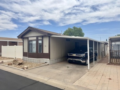 This immaculate 2-bedroom, 2-bath manufactured home is a rare on The Ledges Golf Club in Utah - for sale on GolfHomes.com, golf home, golf lot