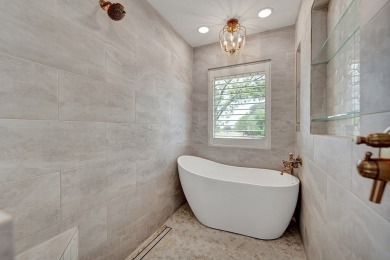 WELCOME TO 5102 TEAKWOOD TRACE, A REFINED RETREAT IN THE HEART on Green Tree Country Club in Texas - for sale on GolfHomes.com, golf home, golf lot
