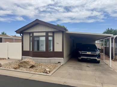This immaculate 2-bedroom, 2-bath manufactured home is a rare on The Ledges Golf Club in Utah - for sale on GolfHomes.com, golf home, golf lot