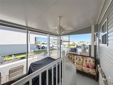 INTRODUCING this VERY unique, yet MODERN, hurricane RESISTANT on Lily Lake Golf and RV Resort in Florida - for sale on GolfHomes.com, golf home, golf lot