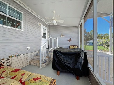 INTRODUCING this VERY unique, yet MODERN, hurricane RESISTANT on Lily Lake Golf and RV Resort in Florida - for sale on GolfHomes.com, golf home, golf lot