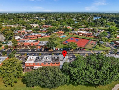 Now offered at $449,999 -- newly priced for quick sale! Perfect on Pembroke Lakes Golf Club in Florida - for sale on GolfHomes.com, golf home, golf lot