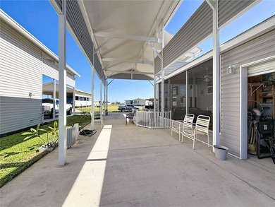 INTRODUCING this VERY unique, yet MODERN, hurricane RESISTANT on Lily Lake Golf and RV Resort in Florida - for sale on GolfHomes.com, golf home, golf lot