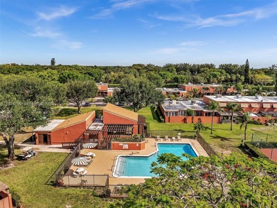 Now offered at $449,999 -- newly priced for quick sale! Perfect on Pembroke Lakes Golf Club in Florida - for sale on GolfHomes.com, golf home, golf lot