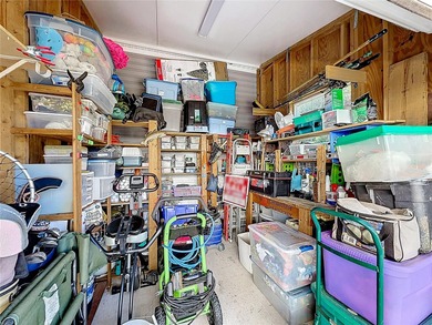 INTRODUCING this VERY unique, yet MODERN, hurricane RESISTANT on Lily Lake Golf and RV Resort in Florida - for sale on GolfHomes.com, golf home, golf lot