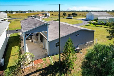 INTRODUCING this VERY unique, yet MODERN, hurricane RESISTANT on Lily Lake Golf and RV Resort in Florida - for sale on GolfHomes.com, golf home, golf lot