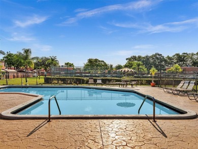 Now offered at $449,999 -- newly priced for quick sale! Perfect on Pembroke Lakes Golf Club in Florida - for sale on GolfHomes.com, golf home, golf lot