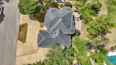 WELCOME TO 5102 TEAKWOOD TRACE, A REFINED RETREAT IN THE HEART on Green Tree Country Club in Texas - for sale on GolfHomes.com, golf home, golf lot