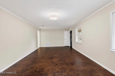 Welcome home this charming Fort Bayou Estates rancher with on Gulf Hills Golf Club in Mississippi - for sale on GolfHomes.com, golf home, golf lot