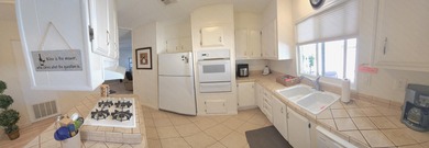 This move-in ready, fully furnished 2-bedroom, 2-bathroom on Palm Desert Greens Country Club in California - for sale on GolfHomes.com, golf home, golf lot