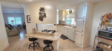 This move-in ready, fully furnished 2-bedroom, 2-bathroom on Palm Desert Greens Country Club in California - for sale on GolfHomes.com, golf home, golf lot