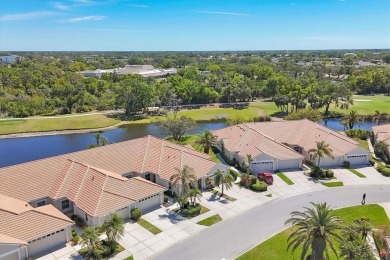 PANORAMIC VIEWS OF LAKE, GOLF COURSE, AND PRESERVE.  This must on Pelican Pointe Golf and Country Club in Florida - for sale on GolfHomes.com, golf home, golf lot