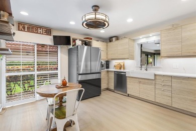 This impeccably remodeled 3 bdr residence is a true standout In on Woodmont Country Club in Florida - for sale on GolfHomes.com, golf home, golf lot
